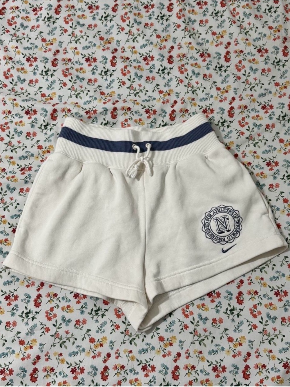 Nike White Athletic Shorts with Navy Waistband and Crest